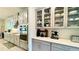 Stylish kitchen featuring stainless steel appliances, light gray cabinets, and ample counter space at 1835 Wellston Dr, Lawrenceville, GA 30043