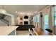 Bright living room features fireplace, a TV, large windows, and an open layout at 1835 Wellston Dr, Lawrenceville, GA 30043