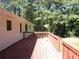 Spacious wooden deck overlooking the backyard at 2107 Briarwood Ct, Snellville, GA 30078