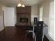 Inviting dining room featuring hardwood floors, a fireplace, and abundant natural light at 2107 Briarwood Ct, Snellville, GA 30078