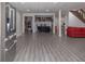 Expansive basement with modern flooring and recessed lights, including an additional dining space and a kitchen area at 2295 Piedmont Ridge Ct, Marietta, GA 30062