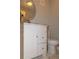 Bathroom with a white vanity and white tiled flooring and a toilet at 2295 Piedmont Ridge Ct, Marietta, GA 30062