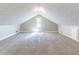 Large bonus room with vaulted ceiling, neutral carpet and lots of light at 6330 Phillips Pl, Lithonia, GA 30058