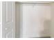 A well-lit closet features neutral paint and a hanging rod for maximum storage at 6330 Phillips Pl, Lithonia, GA 30058