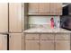 Kitchen features countertops, ample cabinet space, and a kitchen appliance at 6330 Phillips Pl, Lithonia, GA 30058