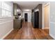 Bright kitchen featuring countertops, updated appliances, and hardwood floors at 6330 Phillips Pl, Lithonia, GA 30058