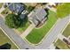 Large yard featuring mature trees, well-maintained lawn, and extended driveway at 1005 Anise Ct, Dacula, GA 30019