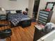 Comfortable bedroom with hardwood floors, large closet and modern dresser at 1075 Peachtree Ne Walk # 506, Atlanta, GA 30309