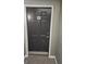 Condo front door with silver hardware and doorplate number A506 at 1075 Peachtree Ne Walk # 506, Atlanta, GA 30309