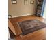Spacious living room featuring hardwood floors and a decorative rug at 1075 Peachtree Ne Walk # 506, Atlanta, GA 30309