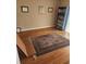 Bright home office featuring hardwood floors, a Persian rug, and ample natural light at 1075 Peachtree Ne Walk # 506, Atlanta, GA 30309