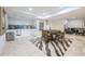 Basement recreational area with game table, kitchenette, and zebra rug at 120 Milano Sw Dr, South Fulton, GA 30331