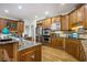 Gourmet kitchen featuring stainless steel appliances, granite countertops, and wooden cabinets at 120 Milano Sw Dr, South Fulton, GA 30331