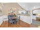 Charming dining area with hardwood floors and chandelier at 402 Silver Summit Se Dr, Conyers, GA 30094