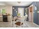 Charming kitchen with white subway tile, unique flooring, and a view to the backyard at 1214 Marshall Fuller Rd, Dallas, GA 30157