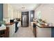 Bright kitchen with new stainless steel appliances, wood countertops, and patterned tile flooring at 1214 Marshall Fuller Rd, Dallas, GA 30157