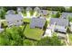 Aerial view of a landscaped backyard with patio furniture, enclosed by a wooden privacy fence at 256 Bollen Ln, Hiram, GA 30141