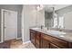 Bathroom with granite counters, dual sinks, and a shower is the perfect place to prepare for your day at 256 Bollen Ln, Hiram, GA 30141