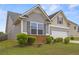 Side view of a two story home featuring gray siding and a well-manicured lawn at 256 Bollen Ln, Hiram, GA 30141