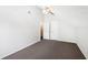 A bedroom with ample closet space and an open doorway at 3479 Portsmouth Cir, Lithonia, GA 30038