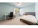 Light and airy bedroom featuring carpet flooring, modern lighting, and large windows at 4862 Tarry Post Ln, Suwanee, GA 30024