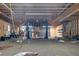 Large garage interior featuring car lifts and ample space for projects at 5520 Hearn Rd, Ellenwood, GA 30294