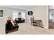Cozy bedroom with carpet, natural light, and a workspace, ideal for relaxation at 220 Cameron Ways, Covington, GA 30016
