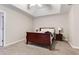 Cozy bedroom with a neutral color palette, carpet, and ample natural light at 220 Cameron Ways, Covington, GA 30016