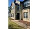 Charming brick two-story home with a welcoming front entrance and well-maintained landscaping at 220 Cameron Ways, Covington, GA 30016
