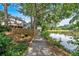 Backyard path beside lake for outdoor enjoyment and easy access to the water at 4508 Club House Dr, Marietta, GA 30066