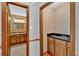 Half bath and a full bath with a sink and granite countertop and tile floor at 4508 Club House Dr, Marietta, GA 30066