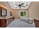 Bright bathroom featuring a soaking tub, skylight, and a double sink vanity at 4508 Club House Dr, Marietta, GA 30066