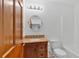 Bathroom features granite countertop and wood cabinet at 4508 Club House Dr, Marietta, GA 30066