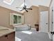 Bright bathroom featuring a soaking tub, skylight, and a double sink vanity at 4508 Club House Dr, Marietta, GA 30066