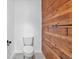Bathroom with wood accent wall and modern fixtures at 4508 Club House Dr, Marietta, GA 30066