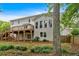 Back of house, featuring a deck, access to yard and mature trees at 4508 Club House Dr, Marietta, GA 30066