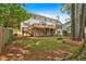 Two-story home with a large deck and a well-maintained backyard, ideal for entertaining at 4508 Club House Dr, Marietta, GA 30066