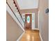 Bright foyer with hardwood floors and decorative front door at 4508 Club House Dr, Marietta, GA 30066