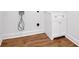 Laundry room with wood look floor at 4508 Club House Dr, Marietta, GA 30066