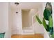 Entryway with stairs, neutral paint, light wood flooring and clear accent chair at 4590 Galleon Xing, Decatur, GA 30035