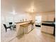 Bright kitchen with white cabinets, modern appliances, and eat-in area at 4590 Galleon Xing, Decatur, GA 30035