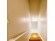 Bright staircase with hardwood steps, white walls, and natural light at 4590 Galleon Xing, Decatur, GA 30035