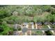 Neighborhood aerial view featuring tree-lined streets and well-maintained homes, offering a serene and picturesque community setting at 4799 Winterview Ln, Douglasville, GA 30135