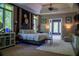 Spacious bedroom with large windows, modern design, and calming colors creating a peaceful retreat at 4799 Winterview Ln, Douglasville, GA 30135