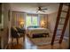 Bright bedroom featuring a loft ladder, natural light, and neutral tones at 4799 Winterview Ln, Douglasville, GA 30135