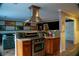 Kitchen featuring stainless steel appliances, granite counters, and modern vent hood at 4799 Winterview Ln, Douglasville, GA 30135