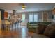 Spacious living area with breakfast bar, comfortable seating, and tile floors at 4799 Winterview Ln, Douglasville, GA 30135