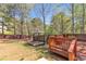 Relax on this wooden deck and enjoy the gazebo in the private, fenced backyard at 7228 Silverleaf Cir, Fairburn, GA 30213