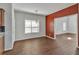 Cozy breakfast area with hardwood floors, natural light, and access to the kitchen at 7228 Silverleaf Cir, Fairburn, GA 30213