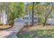 Charming two-story home featuring a well-maintained yard and a cozy, inviting facade at 11205 Abbotts Station Dr, Duluth, GA 30097